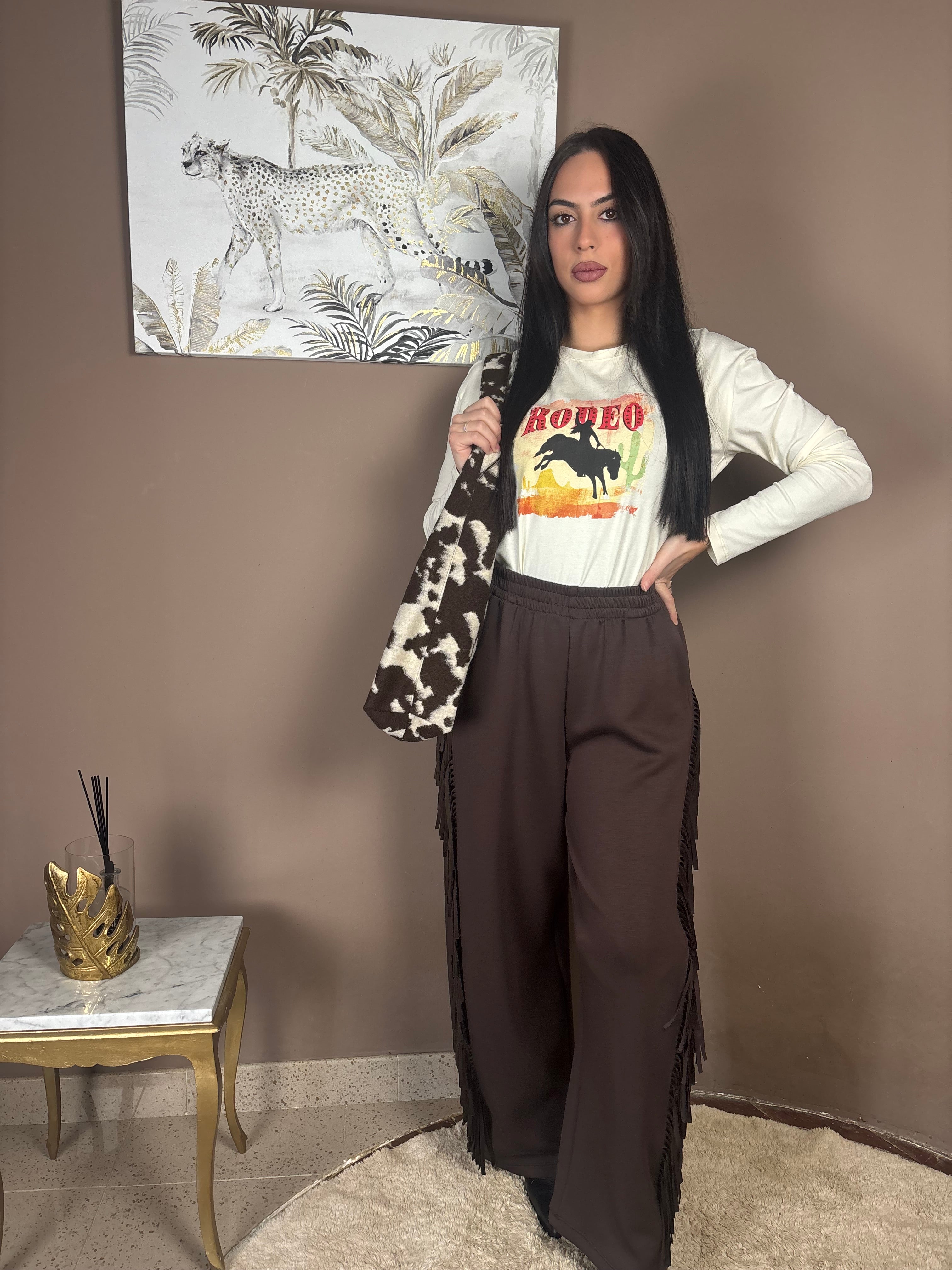 Pantaloni con frange