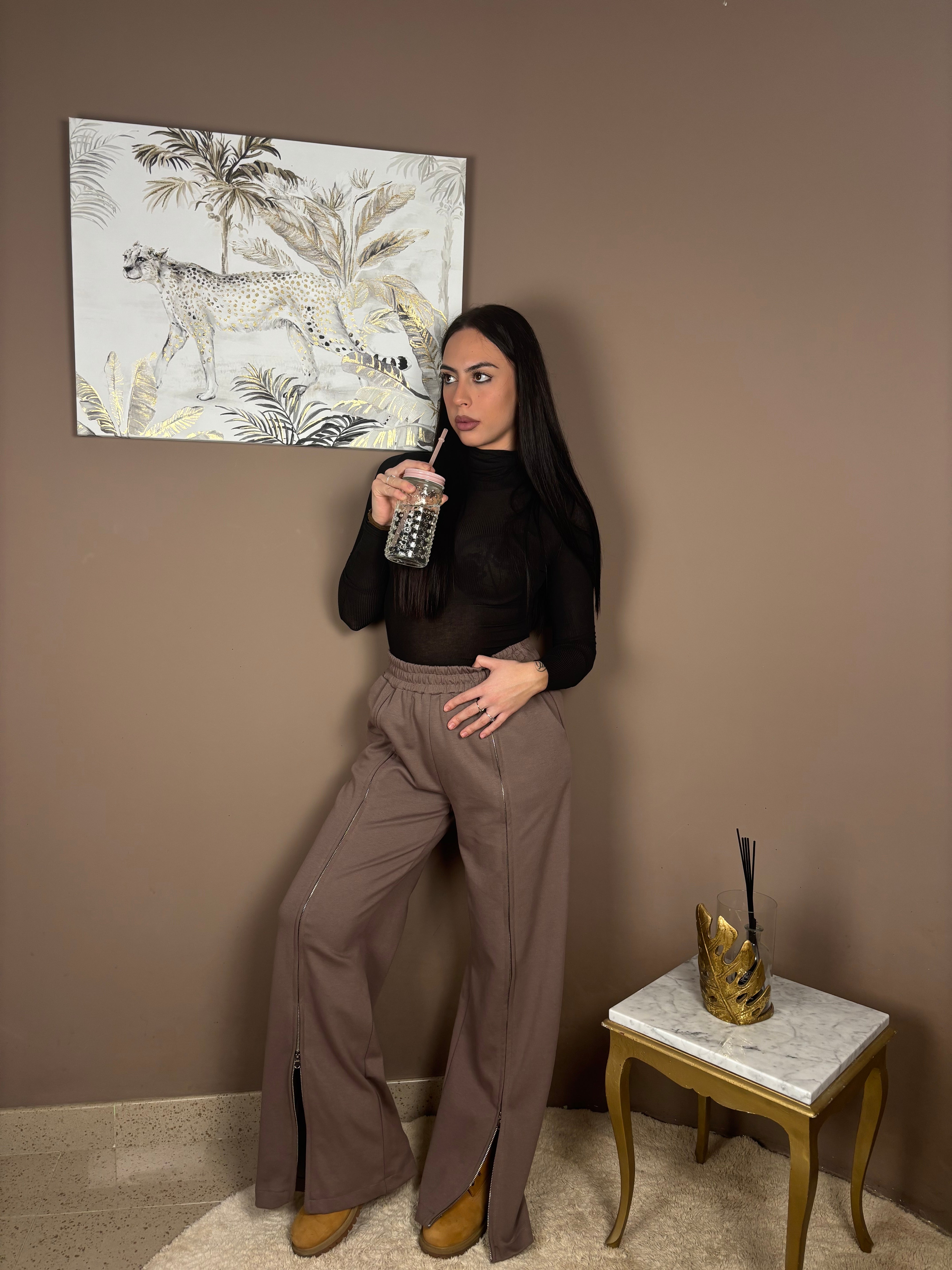 Pantaloni con cerniera